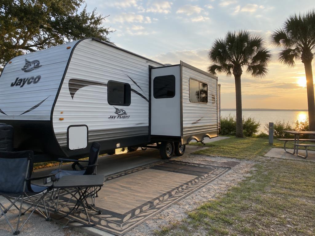 Travel trailer parked near the water in Florida